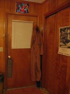 my lovely coveralls, hanging by the door and ready to be donned