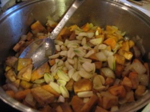 add garlic cloves to the pot