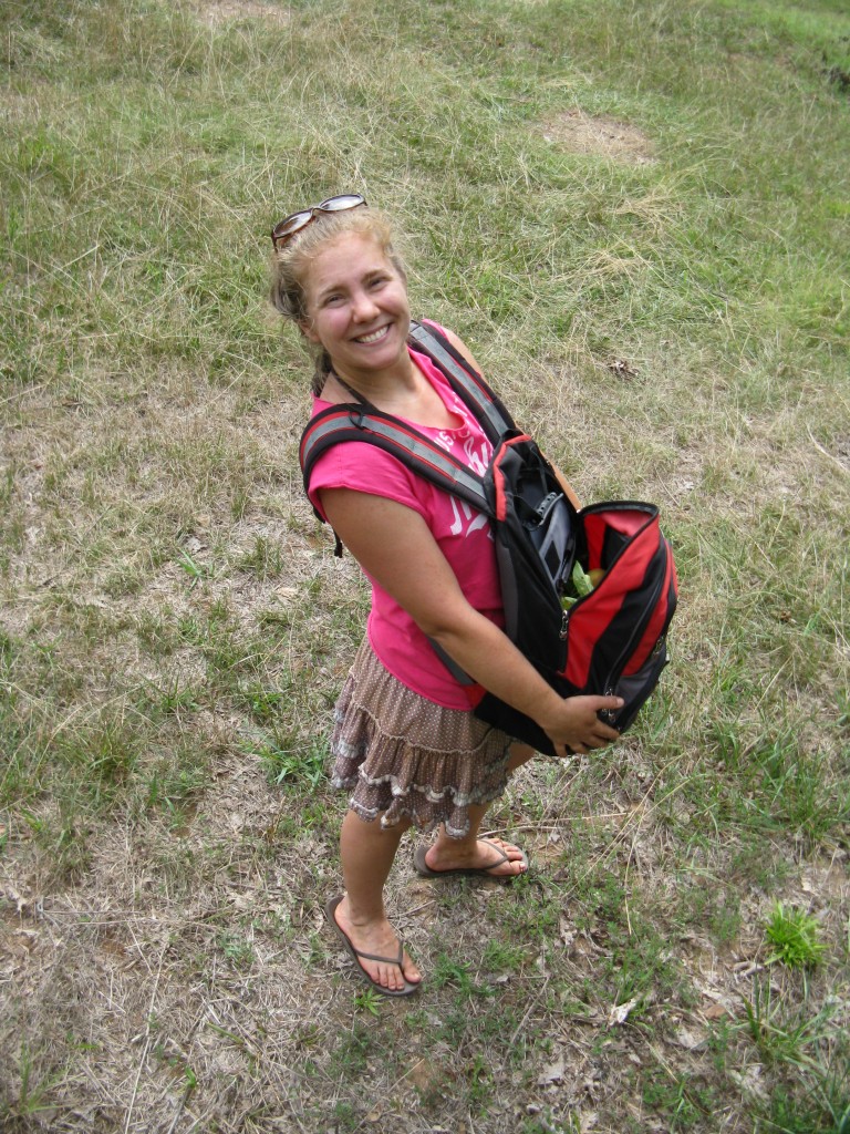 my picking basket. a backpack hung over my front makes it easy to place the apples i pick inside. plus, it's practice for being pregnant in the next few years.. ha, ha!