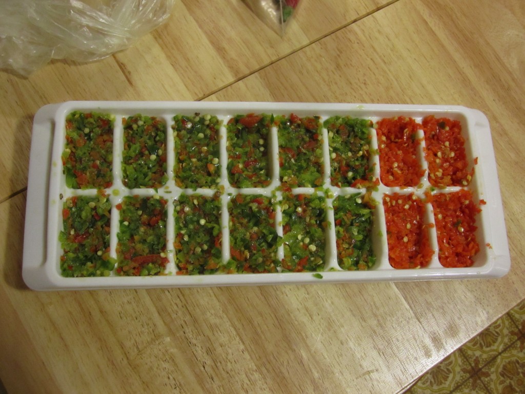 jalapenos and aji peppers about to be turned into spicy ice cubes!